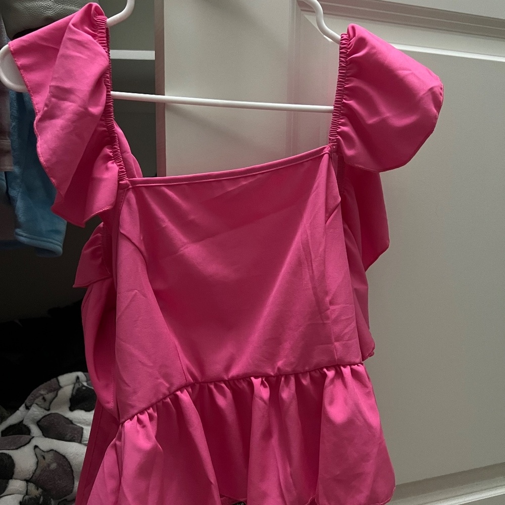 Hot pink ruffle with crossed back tank top